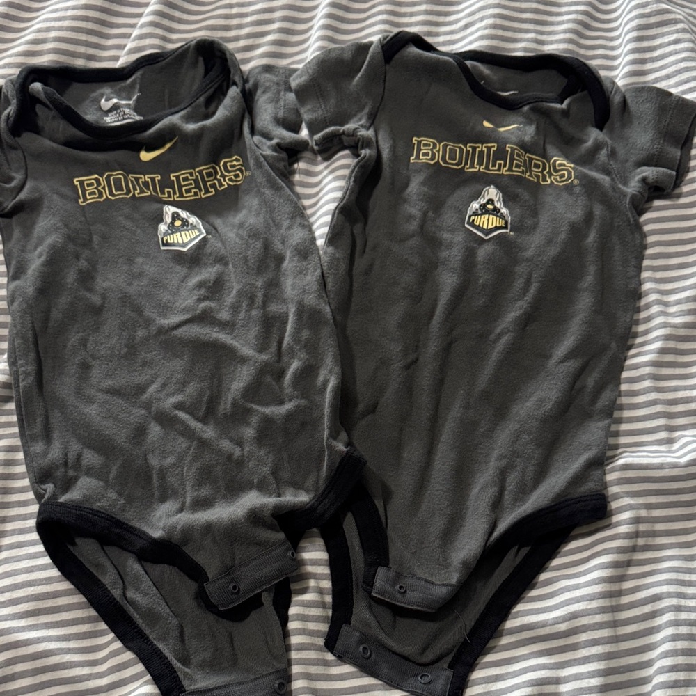 Pair on Nike Purdue onesies